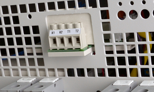 temperature monitoring circuit inputs for the motor temperature sensor and other machine monitors.